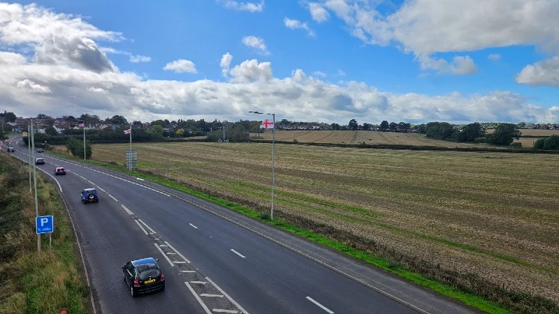 Flags displayed along a road near Shrewsbury